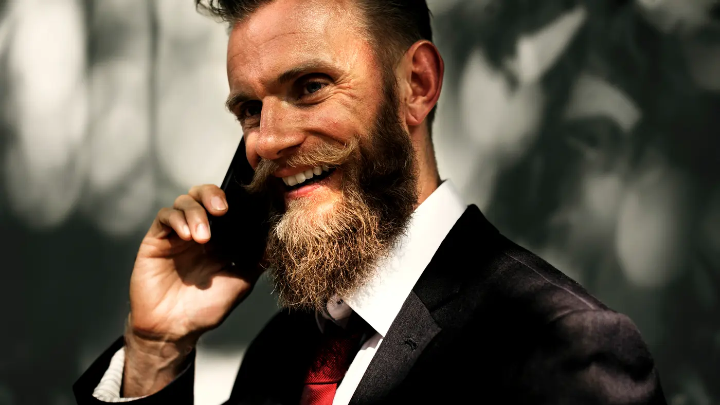 Smiling businessman talking on a phone