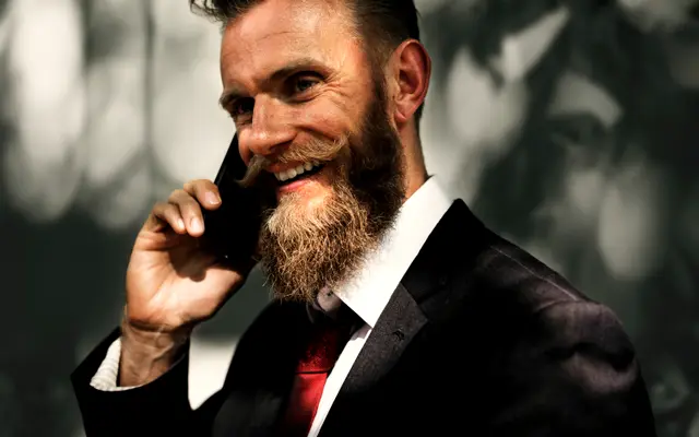 Smiling businessman talking on a phone
