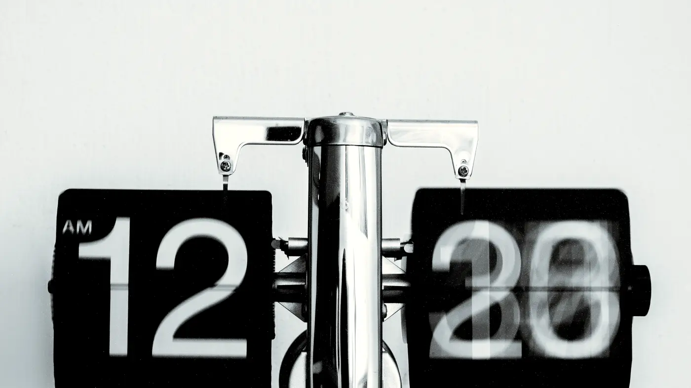 Flip clock showing twelve twenty